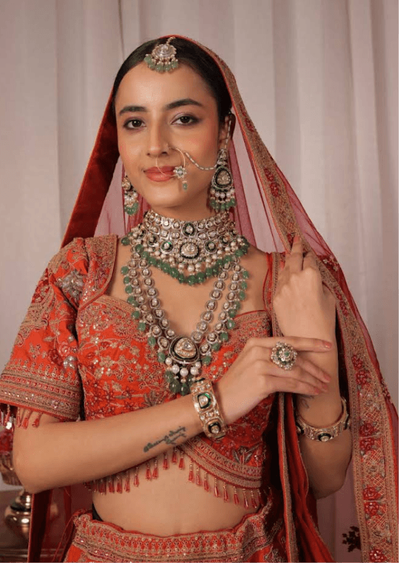 Polki kundan bridal necklace with green drops and maang tikka
